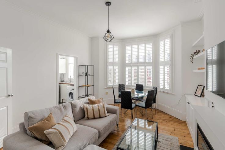 Elegantly designed living room with modern furnishings in an apartment at Building Priory Park Road - frankiesays - 1491005 in London Borough of Brent, London