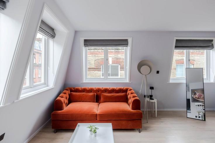 Elegantly designed living room with modern furnishings in an apartment at Building Brewer Street - frankiesays - 1028593 - LON in City of Westminster, London