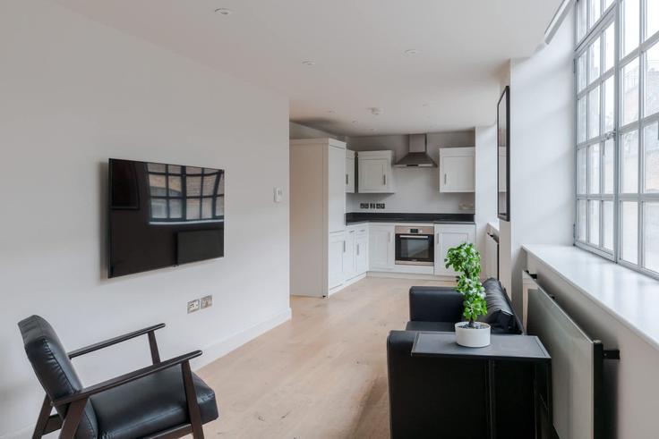 Sala de estar elegantemente projetada com móveis modernos em um apartamento no Building Eyre Street Hill - frankiesays - 1028601 - LON em London Borough of Islington, London Sala de estar elegantemente projetada com móveis modernos em um apartamento no Building Eyre Street Hill - frankiesays - 1028601 - LON em London Borough of Islington, London