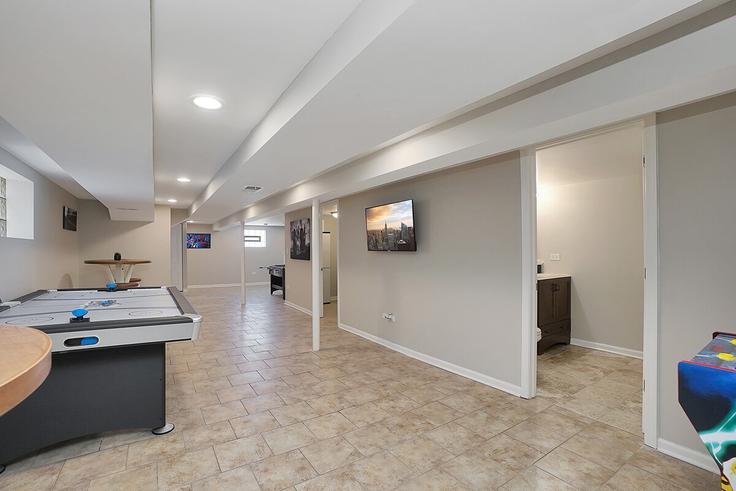 Elegantly designed living room with modern furnishings in an apartment at Building South Nagle Avenue - freestand-home-solutions - 1285032 - CHI in Chicago, Chicago