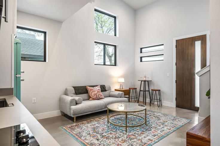 Elegantly designed living room with modern furnishings in an apartment at Building Webberville Road - frenchcowboys - 1504765 in Austin, Austin Elegantly designed living room with modern furnishings in an apartment at Building Webberville Road - frenchcowboys - 1504765 in Austin, Austin