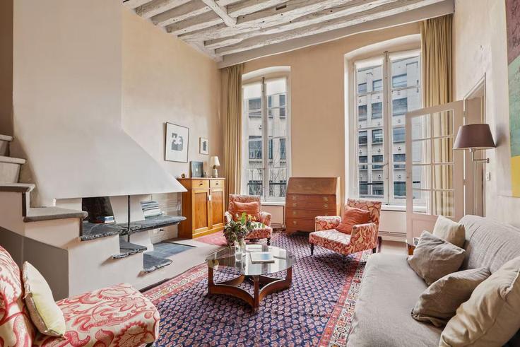 Building Boulevard Saint-Germain - full-concierge - 1490316 adresindeki bir dairede modern mobilyalarla zarif bir şekilde tasarlanmış oturma odası 7th arrondissement, Paris