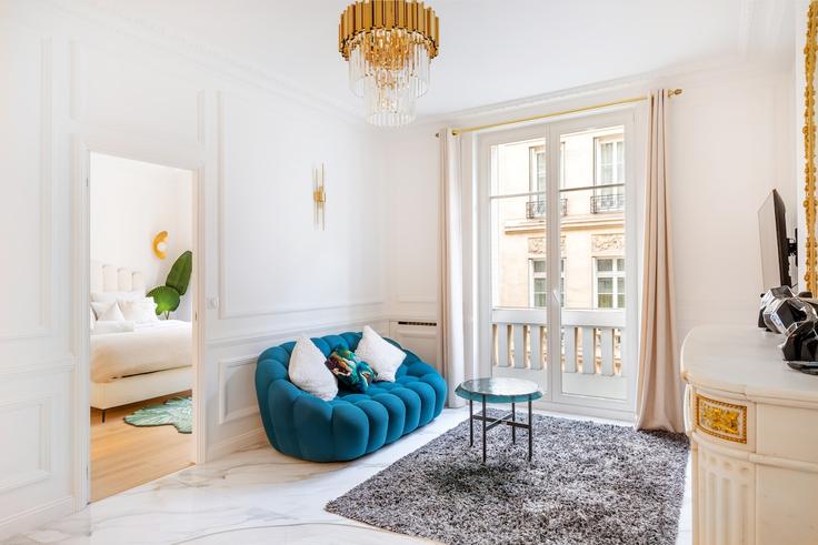 Elegantly designed living room with modern furnishings in an apartment at Building Rue Quentin Bauchart - full-concierge - 1516039 in 8th arrondissement, Paris