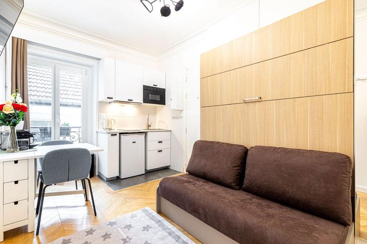 Elegant gestaltetes Wohnzimmer mit moderner Einrichtung in einer Wohnung im Building Boulevard du Montparnasse - full-concierge - 1565865 in 15th arrondissement, Paris Elegant gestaltetes Wohnzimmer mit moderner Einrichtung in einer Wohnung im Building Boulevard du Montparnasse - full-concierge - 1565865 in 15th arrondissement, Paris
