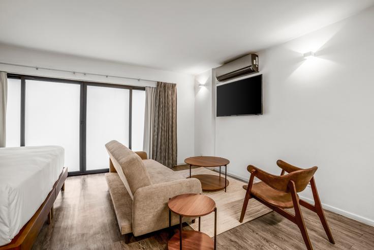 Elegante sala de estar con mobiliario moderno en un apartamento en Building Río Nazas - furnished-club-1 - 1604432 en Mexico City, Mexico City Elegante sala de estar con mobiliario moderno en un apartamento en Building Río Nazas - furnished-club-1 - 1604432 en Mexico City, Mexico City