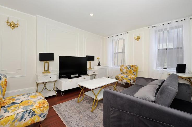 Elegantly designed living room with modern furnishings in an apartment at Building Centre Street - furnishedhabitat - 1323919 in Manhattan, New York