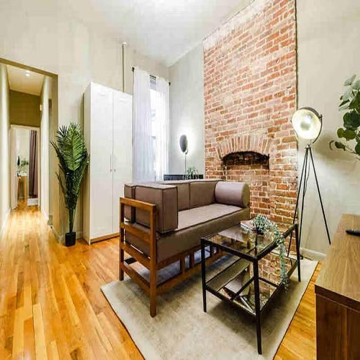 Salle de séjour élégante avec mobilier moderne dans un appartement à Building West 84th Street - furnishedhabitat - 1323892 à Manhattan, New York Salle de séjour élégante avec mobilier moderne dans un appartement à Building West 84th Street - furnishedhabitat - 1323892 à Manhattan, New York