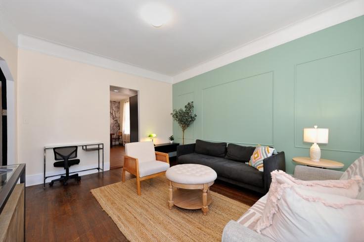 Elegantly designed living room with modern furnishings in an apartment at Building 9th Avenue - furnishedhabitat - 1323923 in Manhattan, New York Elegantly designed living room with modern furnishings in an apartment at Building 9th Avenue - furnishedhabitat - 1323923 in Manhattan, New York