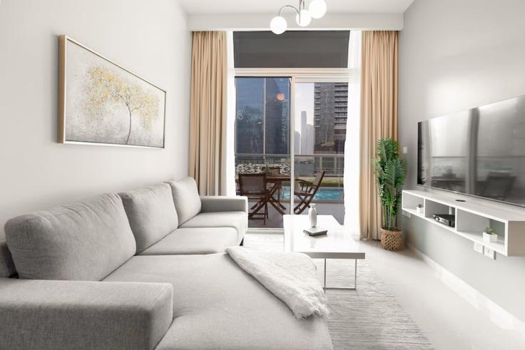 Elegantly designed living room with modern furnishings in an apartment at Building Marasi Drive - gala-guests-vacation-homes-rental - 1516354 in Business Bay, Dubai