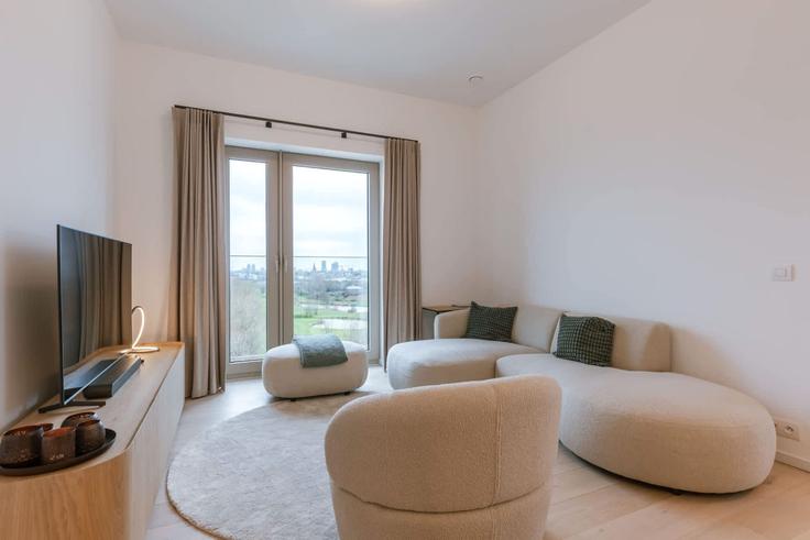 Sala de estar elegantemente projetada com móveis modernos em um apartamento no Building Troonstraat - glan-services - 1525585 em Ostend, Ostend Sala de estar elegantemente projetada com móveis modernos em um apartamento no Building Troonstraat - glan-services - 1525585 em Ostend, Ostend