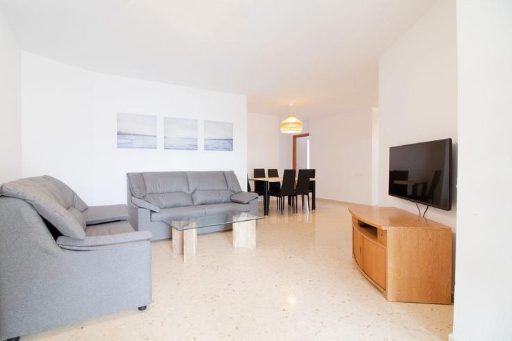 Elegante sala de estar con mobiliario moderno en un apartamento en Building Carrer Mare Nostrum - global-vacacional - 1339825 en Canet de Berenguer, Canet de Berenguer Elegante sala de estar con mobiliario moderno en un apartamento en Building Carrer Mare Nostrum - global-vacacional - 1339825 en Canet de Berenguer, Canet de Berenguer