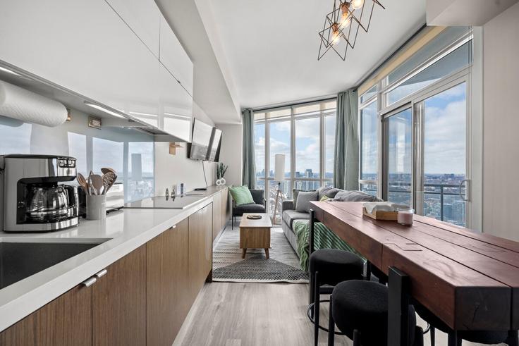 Salle de séjour élégante avec mobilier moderne dans un appartement à Building Fort York Boulevard - globalstayinc - 1346011 à Old Toronto, Toronto Salle de séjour élégante avec mobilier moderne dans un appartement à Building Fort York Boulevard - globalstayinc - 1346011 à Old Toronto, Toronto