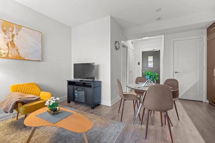 Elegantly designed living room with modern furnishings in an apartment at Building Sheppard Avenue East - globalstayinc - 1511361 in North York, Toronto