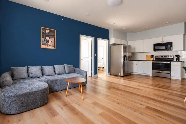 Elegante sala de estar con mobiliario moderno en un apartamento en Building Ridge Avenue - globenest - 1314954 - USA en Philadelphia, Philadelphia Elegante sala de estar con mobiliario moderno en un apartamento en Building Ridge Avenue - globenest - 1314954 - USA en Philadelphia, Philadelphia