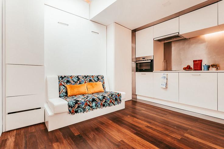 Sala de estar elegantemente projetada com móveis modernos em um apartamento no Building Travessa De São José - go-to-house-lisbon - 1288606 - LIS em Misericórdia, Lisbon Sala de estar elegantemente projetada com móveis modernos em um apartamento no Building Travessa De São José - go-to-house-lisbon - 1288606 - LIS em Misericórdia, Lisbon