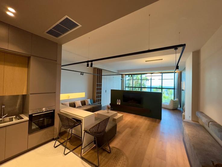 Elegante sala de estar con mobiliario moderno en un apartamento en Building Rruga Taulantia - grandstay-collection - 1405574 en Durrës, Durrës