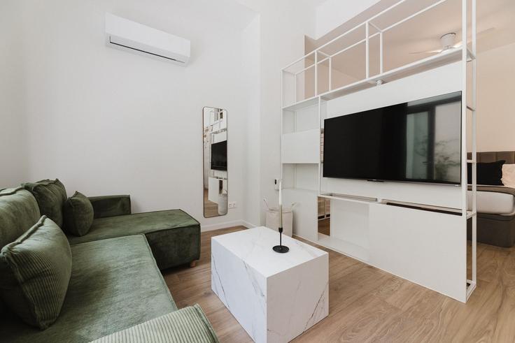 Valencia L'OliveretaのBuilding Carrer de la Democràcia - granturia - 1272061 - MADのアパートメントにある、モダンな家具を備えたエレガントなデザインのリビングルーム Valencia L'OliveretaのBuilding Carrer de la Democràcia - granturia - 1272061 - MADのアパートメントにある、モダンな家具を備えたエレガントなデザインのリビングルーム