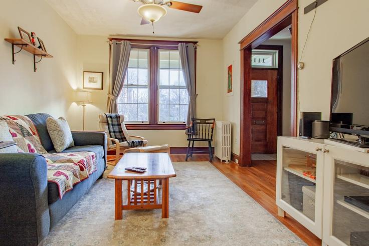 Elegantly designed living room with modern furnishings in an apartment at Building E Street NE - greatdwellings - 1633302 in Washington, Washington
