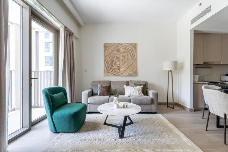 Elegantly designed living room with modern furnishings in an apartment at Building Tariaq Bedon Esm - guestready-dxb - 1497099 in Al Kheeran First, Dubai