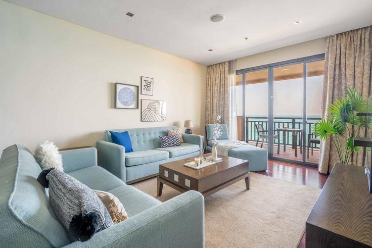 Elegantly designed living room with modern furnishings in an apartment at Building Tariaq Bedon Esm - guestready-dxb - 1386965 in The Palm Jumeirah, Dubai Elegantly designed living room with modern furnishings in an apartment at Building Tariaq Bedon Esm - guestready-dxb - 1386965 in The Palm Jumeirah, Dubai