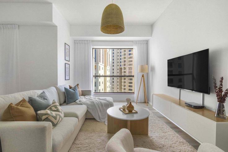 Elegantly designed living room with modern furnishings in an apartment at Building Al Gharbi Street - guestready-dxb - 1497170 in Dubai Marina, Dubai Elegantly designed living room with modern furnishings in an apartment at Building Al Gharbi Street - guestready-dxb - 1497170 in Dubai Marina, Dubai