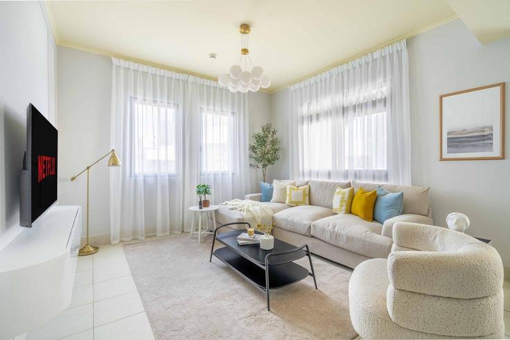 Elegantly designed living room with modern furnishings in an apartment at Building Dubai Fountain Street - guestready-dxb - 1497160 in Downtown Dubai, Dubai