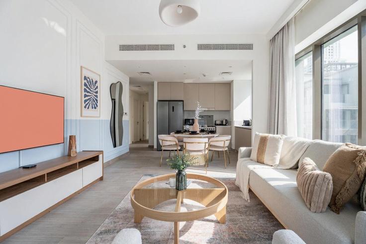 Dubai Al Kheeran FirstのBuilding Tariaq Bedon Esm - guestready-dxb - 1497095のアパートメントにある、モダンな家具を備えたエレガントなデザインのリビングルーム