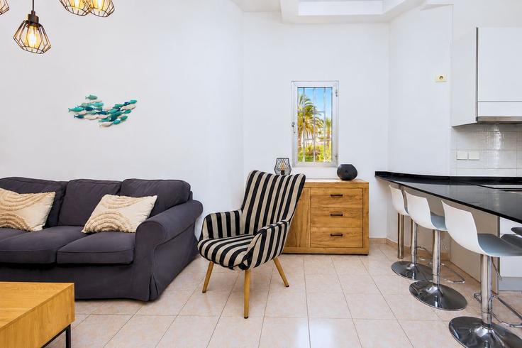 Elegantly designed living room with modern furnishings in an apartment at Building Avenida de Tirajana - guestready-sp - 1510009 in Maspalomas, Maspalomas