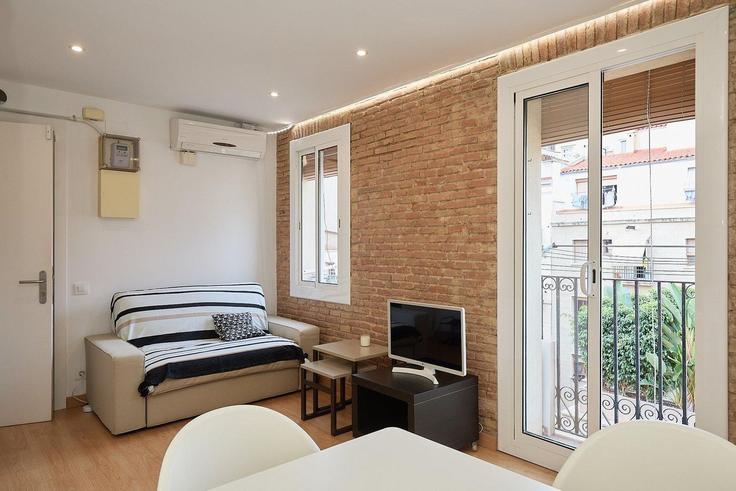 Ciutat Vella, Barcelona에 위치한 Building Carrer de Sant Miquel - guestready-sp - 1510221 유닛의 세련된 인테리어가 돋보이는 거실