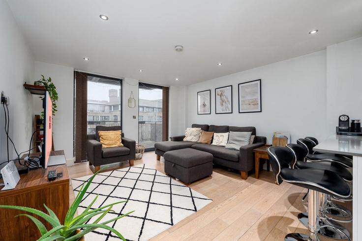 Salle de séjour élégante avec mobilier moderne dans un appartement à Building Fairfield Road - guestready-uk - 1303195 - LON à London Borough of Tower Hamlets, London