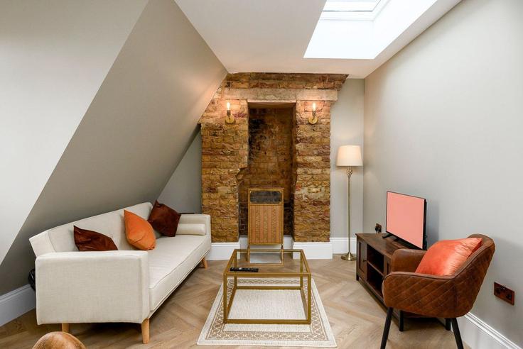 Elegante sala de estar con mobiliario moderno en un apartamento en Building Brixton Road - guestready-uk - 1334488 en London Borough of Lambeth, London Elegante sala de estar con mobiliario moderno en un apartamento en Building Brixton Road - guestready-uk - 1334488 en London Borough of Lambeth, London