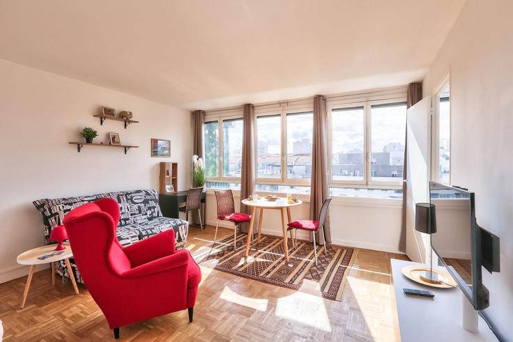 Elegantly designed living room with modern furnishings in an apartment at Building Avenue de Flandre - guestready - 1512893 in 19th arrondissement, Paris Elegantly designed living room with modern furnishings in an apartment at Building Avenue de Flandre - guestready - 1512893 in 19th arrondissement, Paris