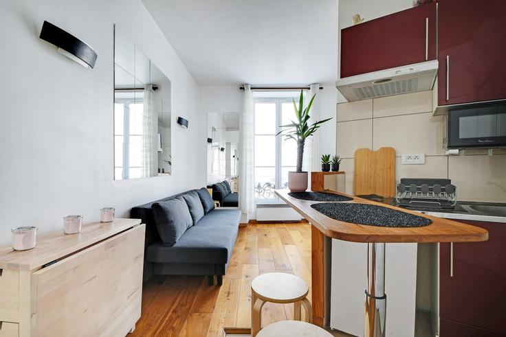 Elegante sala de estar con mobiliario moderno en un apartamento en Building 6 Place Gustave Toudouze, 75009 Paris, France - guestready - 1598679 en 9th arrondissement, Paris Elegante sala de estar con mobiliario moderno en un apartamento en Building 6 Place Gustave Toudouze, 75009 Paris, France - guestready - 1598679 en 9th arrondissement, Paris