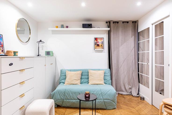 Salle de séjour élégante avec mobilier moderne dans un appartement à Building 64B Rue du Ruisseau, 75018 Paris, France - guestready - 1600782 à 18th arrondissement, Paris Salle de séjour élégante avec mobilier moderne dans un appartement à Building 64B Rue du Ruisseau, 75018 Paris, France - guestready - 1600782 à 18th arrondissement, Paris