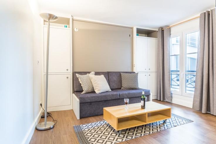 Elegantly designed living room with modern furnishings in an apartment at Building 10 rue croix des petits champs - guestready - 1598837 in 1st arrondissement, Paris Elegantly designed living room with modern furnishings in an apartment at Building 10 rue croix des petits champs - guestready - 1598837 in 1st arrondissement, Paris