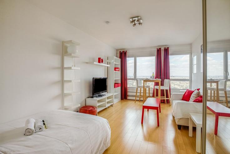 Elegante sala de estar con mobiliario moderno en un apartamento en Building Avenue d'Italie - guestready - 1227194 - PAR en 13th arrondissement, Paris Elegante sala de estar con mobiliario moderno en un apartamento en Building Avenue d'Italie - guestready - 1227194 - PAR en 13th arrondissement, Paris