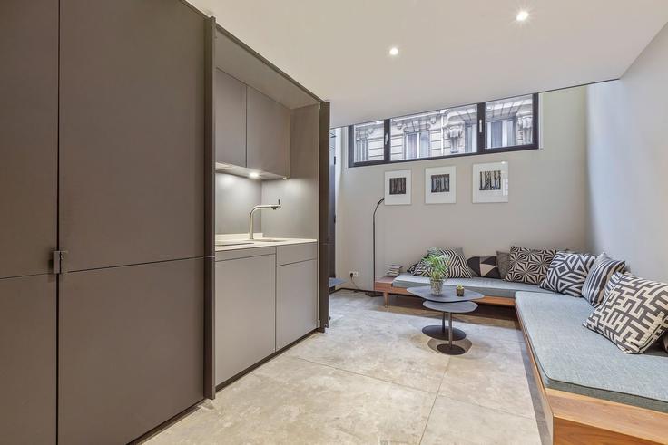 Salle de séjour élégante avec mobilier moderne dans un appartement à Building 35 Rue Lucien Sampaix, 75010, Paris, France - guestready - 1600827 à 10th arrondissement, Paris Salle de séjour élégante avec mobilier moderne dans un appartement à Building 35 Rue Lucien Sampaix, 75010, Paris, France - guestready - 1600827 à 10th arrondissement, Paris