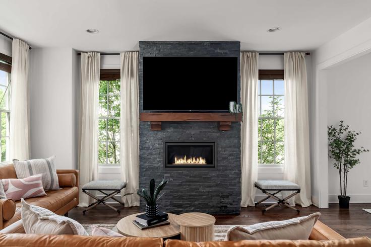 Salle de séjour élégante avec mobilier moderne dans un appartement à Building 12th Avenue South - hallsonhospitality - 1097593 - BNA à Nashville, Nashville Salle de séjour élégante avec mobilier moderne dans un appartement à Building 12th Avenue South - hallsonhospitality - 1097593 - BNA à Nashville, Nashville