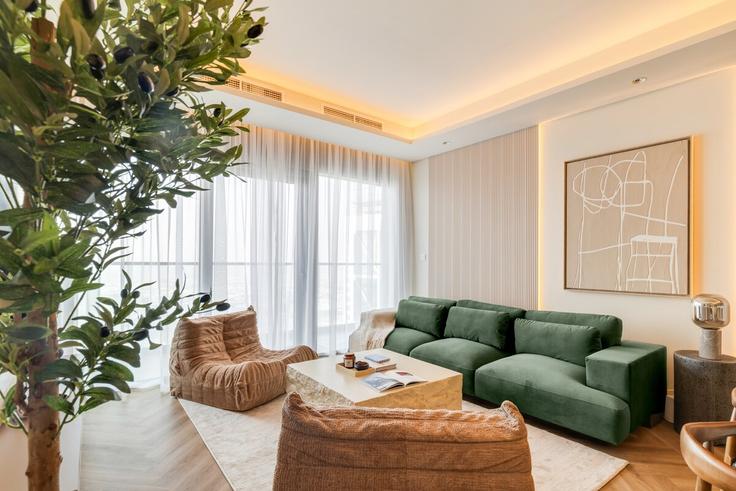 Building Burj Khalifa Boulevard - hamsat-al-naseem-holiday-homes - 1510456 adresindeki bir dairede modern mobilyalarla zarif bir şekilde tasarlanmış oturma odası Burj Khalifa, Dubai