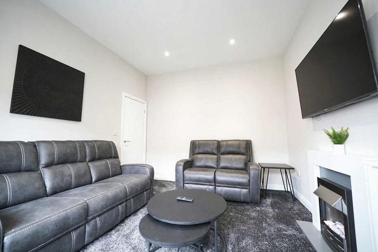 Building Poulton Road - harrris - 1638633 adresindeki bir dairede modern mobilyalarla zarif bir şekilde tasarlanmış oturma odası Wyre District, Fleetwood Building Poulton Road - harrris - 1638633 adresindeki bir dairede modern mobilyalarla zarif bir şekilde tasarlanmış oturma odası Wyre District, Fleetwood