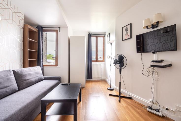 Salle de séjour élégante avec mobilier moderne dans un appartement à Building Avenue Silvestre de Sacy - hatch-partners - 1584292 à 7th arrondissement, Paris Salle de séjour élégante avec mobilier moderne dans un appartement à Building Avenue Silvestre de Sacy - hatch-partners - 1584292 à 7th arrondissement, Paris