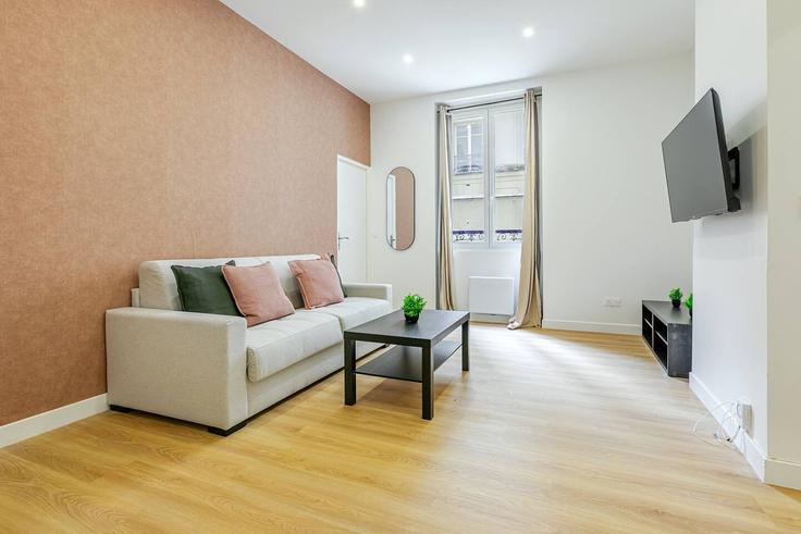 Paris 17th arrondissementのBuilding Rue Cardinet - hatch-partners - 1584501のアパートメントにある、モダンな家具を備えたエレガントなデザインのリビングルーム Paris 17th arrondissementのBuilding Rue Cardinet - hatch-partners - 1584501のアパートメントにある、モダンな家具を備えたエレガントなデザインのリビングルーム