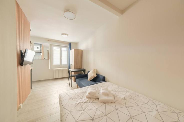 Salle de séjour élégante avec mobilier moderne dans un appartement à Building Rue des Messageries - hatch-partners - 1584613 à 10th arrondissement, Paris Salle de séjour élégante avec mobilier moderne dans un appartement à Building Rue des Messageries - hatch-partners - 1584613 à 10th arrondissement, Paris