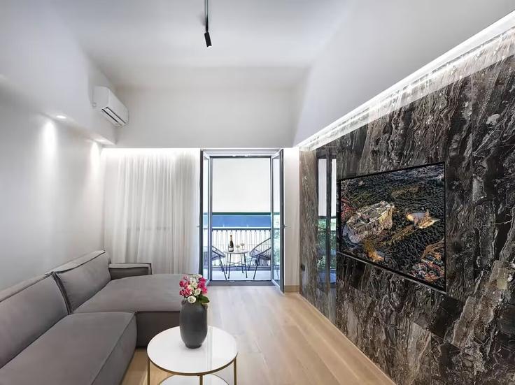 Salle de séjour élégante avec mobilier moderne dans un appartement à Building Omirou - hestia-properties - 1571581 à Central Athens, Athens Salle de séjour élégante avec mobilier moderne dans un appartement à Building Omirou - hestia-properties - 1571581 à Central Athens, Athens