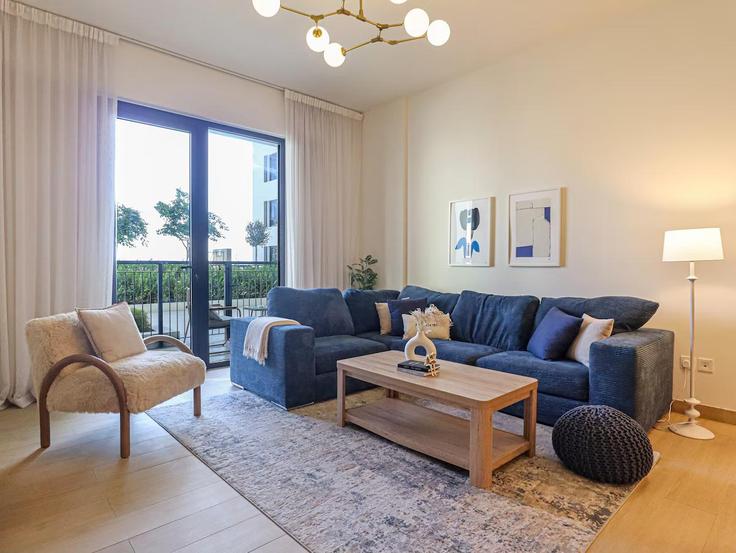 Elegantly designed living room with modern furnishings in an apartment at Building Tariaq Bedon Esm - higuests-vacation-homes-rentals - 1385056 in Dubai, Dubai