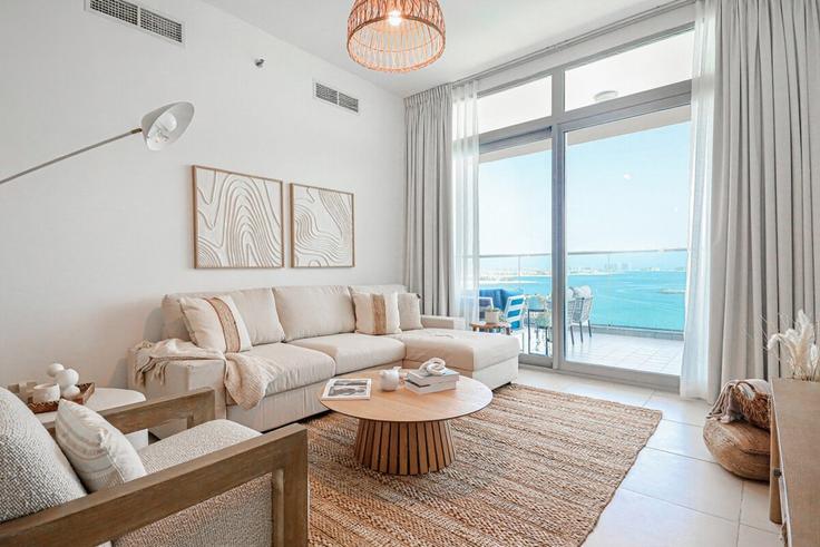 Elegantly designed living room with modern furnishings in an apartment at Building Tariaq Bedon Esm - higuests-vacation-homes-rentals - 1385074 in The Palm Jumeirah, Dubai Elegantly designed living room with modern furnishings in an apartment at Building Tariaq Bedon Esm - higuests-vacation-homes-rentals - 1385074 in The Palm Jumeirah, Dubai