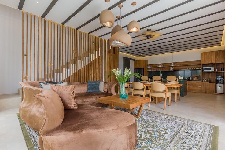 Elegant gestaltetes Wohnzimmer mit moderner Einrichtung in einer Wohnung im Building Gang Pulau 63 - hive-holiday-homes-1 - 1649332 in Kuta Utara, Badung Regency Elegant gestaltetes Wohnzimmer mit moderner Einrichtung in einer Wohnung im Building Gang Pulau 63 - hive-holiday-homes-1 - 1649332 in Kuta Utara, Badung Regency