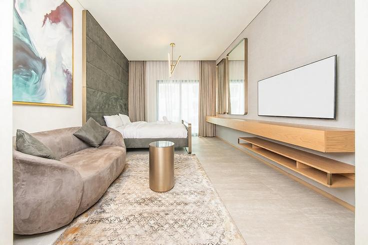 Elegant gestaltetes Wohnzimmer mit moderner Einrichtung in einer Wohnung im Building Tariaq Bedon Esm - hive-holiday-homes-1 - 1649328 in Jumeirah Village, Dubai Elegant gestaltetes Wohnzimmer mit moderner Einrichtung in einer Wohnung im Building Tariaq Bedon Esm - hive-holiday-homes-1 - 1649328 in Jumeirah Village, Dubai