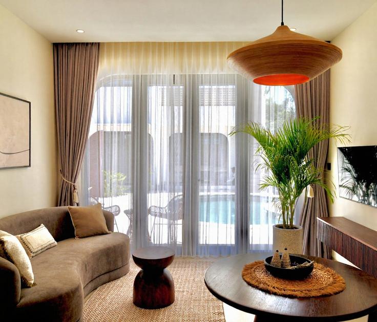 Elegant gestaltetes Wohnzimmer mit moderner Einrichtung in einer Wohnung im Building Jalan Pura Batu Pageh - hive-holiday-homes-1 - 1649247 in South Kuta, Badung Regency Elegant gestaltetes Wohnzimmer mit moderner Einrichtung in einer Wohnung im Building Jalan Pura Batu Pageh - hive-holiday-homes-1 - 1649247 in South Kuta, Badung Regency