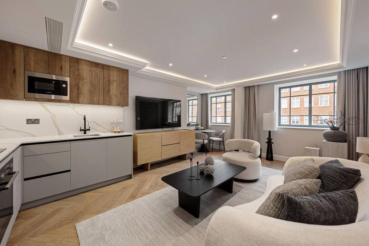 Royal Borough of Kensington and Chelsea, London에 위치한 Building Kensington High Street - hive-stays-ltd - 1504188 유닛의 세련된 인테리어가 돋보이는 거실 Royal Borough of Kensington and Chelsea, London에 위치한 Building Kensington High Street - hive-stays-ltd - 1504188 유닛의 세련된 인테리어가 돋보이는 거실